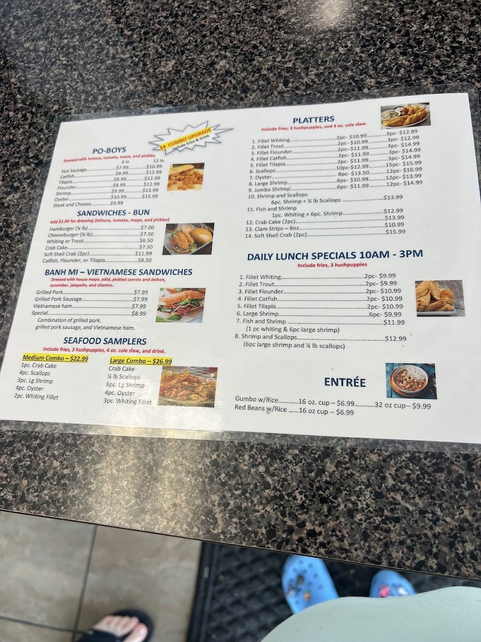 Fried seafood plate with catfish and sides.